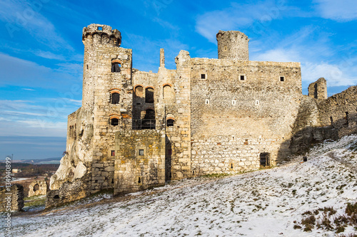 Ruins of the castle Ogrodzieniec in winter season. Poland