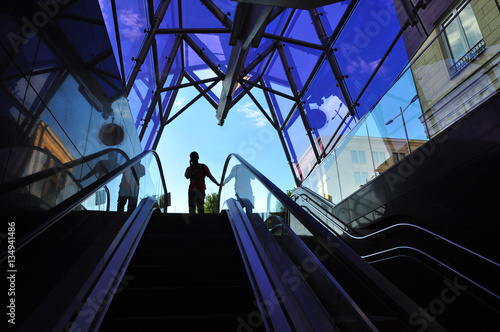 Man entrancing urban subway architecture 