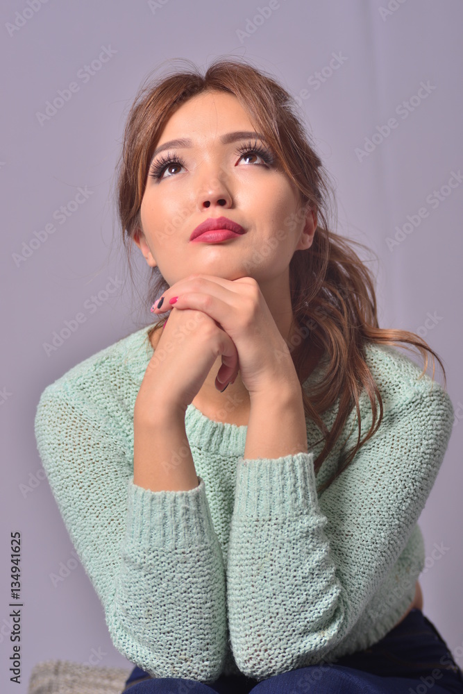 Expressive portrait of a model with a beautiful face and curly hair Expressive portrait of a model with a beautiful face and curly hair