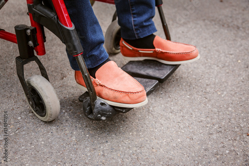 Senior Man In Wheelchair, Close-up Of Feet