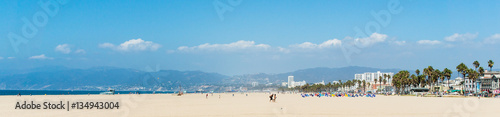 Pacific ocean coastline panorama in Los Angeles USA. People walking at the beach. California beaches panorama. photo