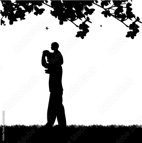 Father carrying a child on his shoulders in the park, one in the series of similar images silhouette