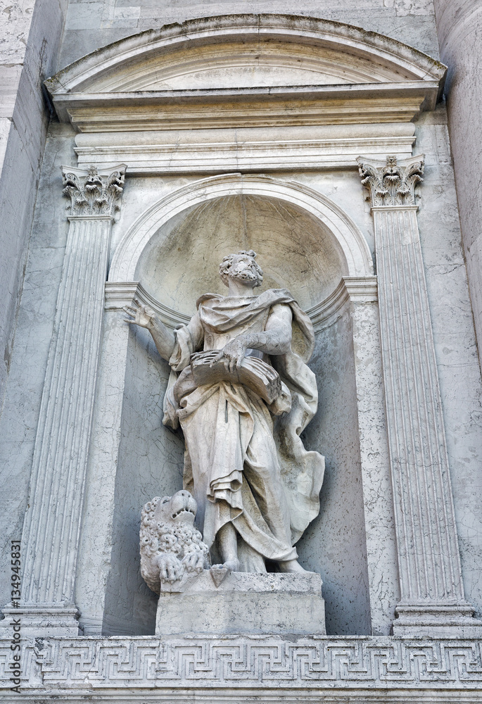 Church del Santissimo Redentore facade wall statue in Venice, Italy.