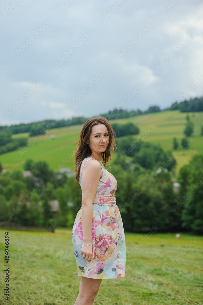 Brunette girl enjoying journey in mountains. Brunette girl enjoying journey in mountains.