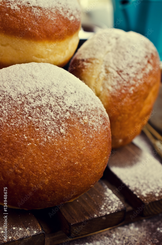 Traditional donuts with powdered sugar Traditional donuts with powdered sugar