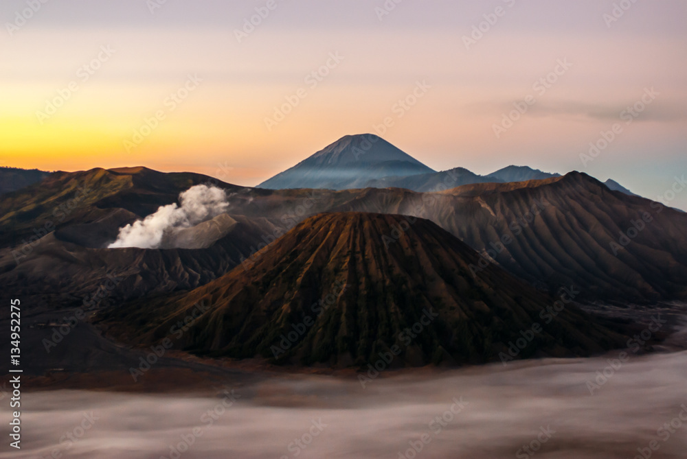 Fototapeta premium Sunrise at volcano Mount Bromo, early