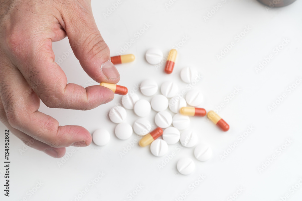 Medication capsule in hand Medication capsule in hand