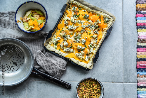 Puff pastry with pumpkin and gorgonzola cheese photo