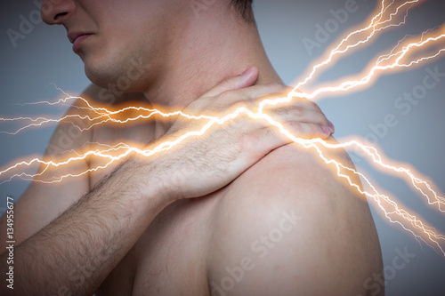 Принти на полотні young man having horribly stiff shoulders