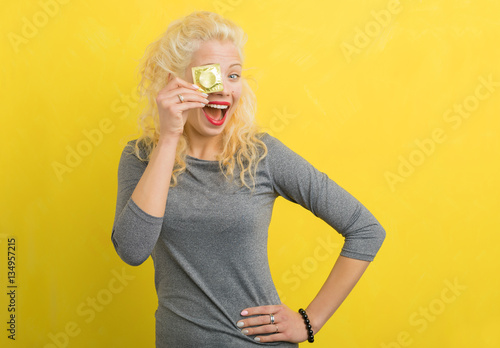 Woman with a condom