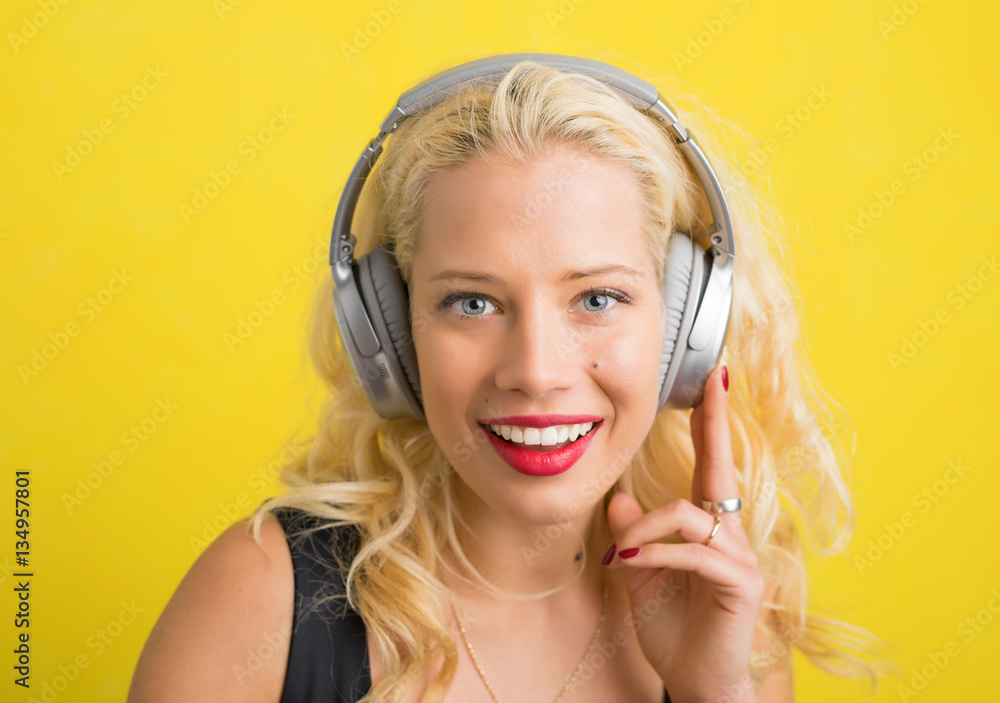 Fototapeta premium Woman with wireless headphones