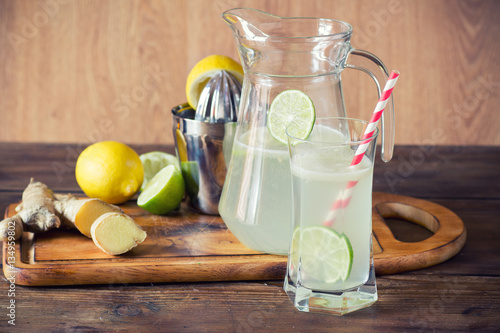  homemade lemonade with ginger on a rustic wooden background