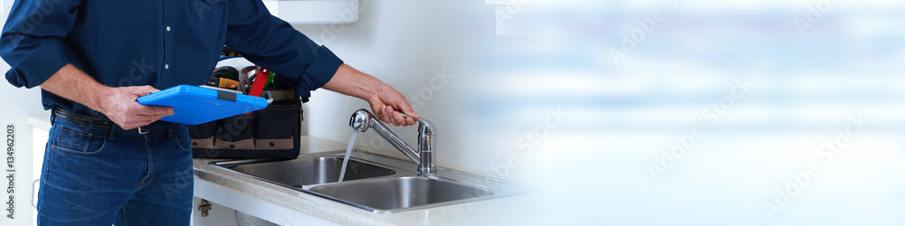Plumber hands with clipboard. Plumber hands with clipboard.