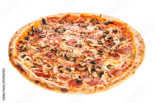 Delicious classic italian Pizza Carbonara with ham, sausages tomatoes, mushrooms and cheese