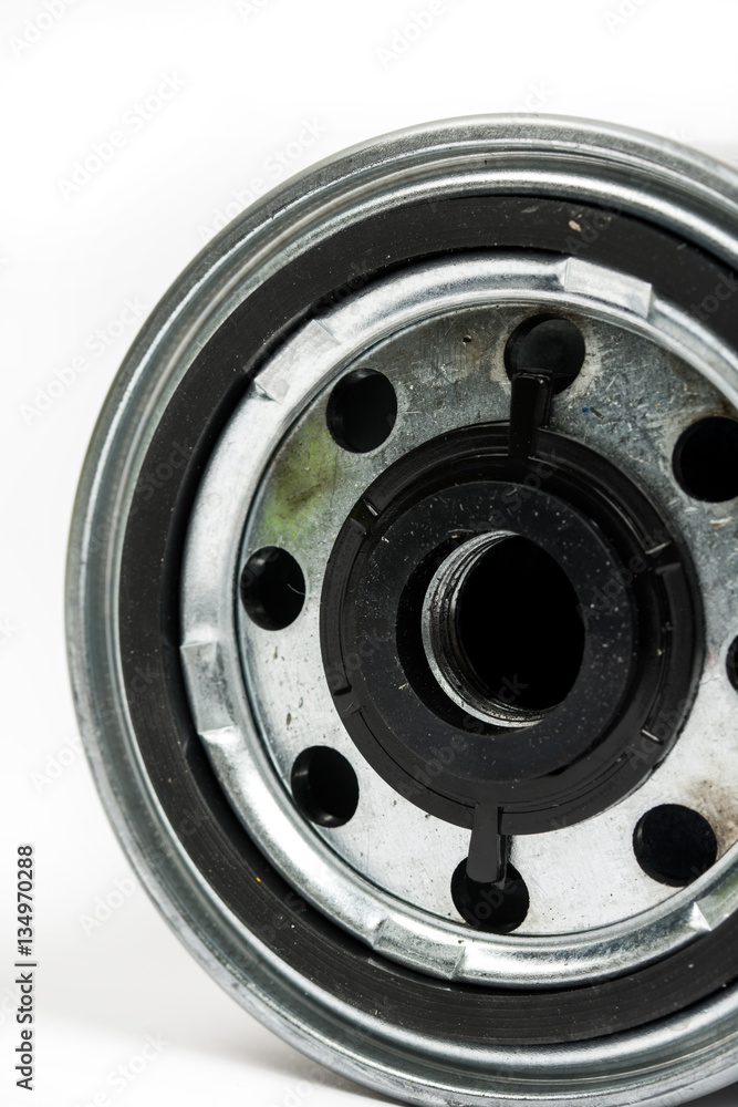 Obraz premium Metal car fuel filter isolated over white background