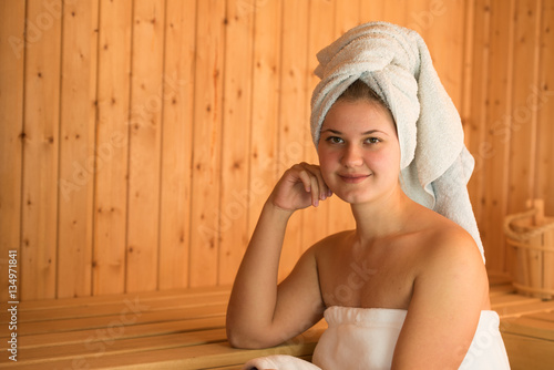 young woman in sauna