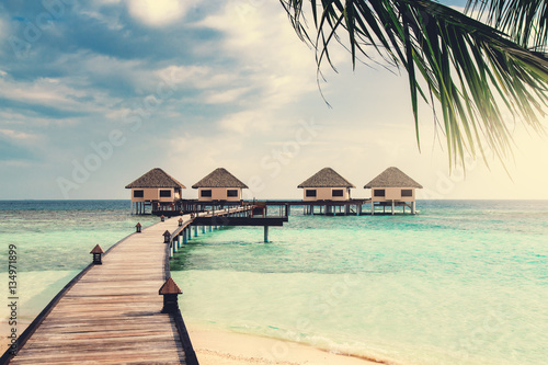 Water bungalows resort at islands. Indian Ocean, Maldives