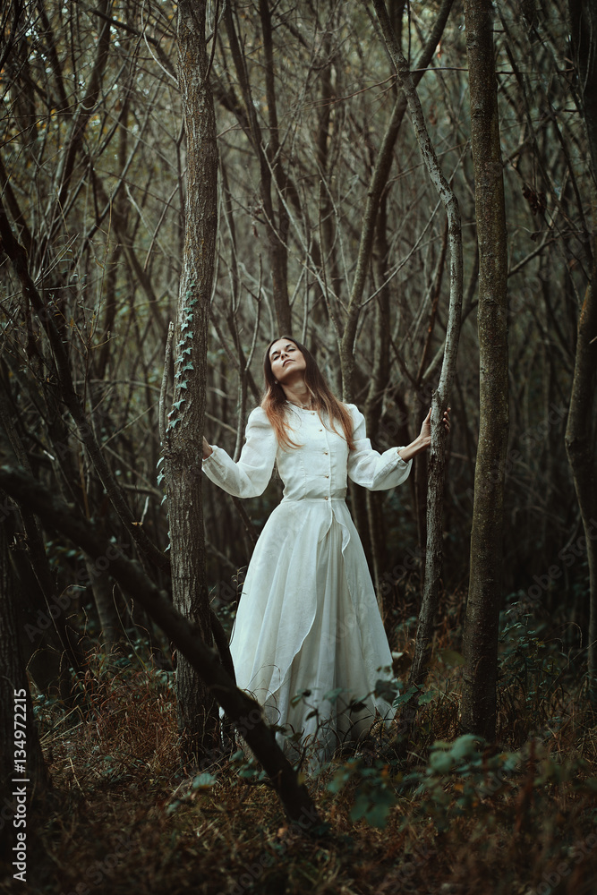 Woman looking for nature wisdom Woman looking for nature wisdom