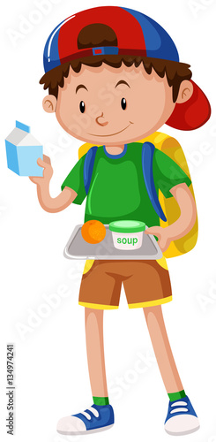 Boy holding tray of food