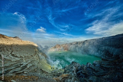 Ijen volcano turquoise-coloured acidic crater lake © buzov