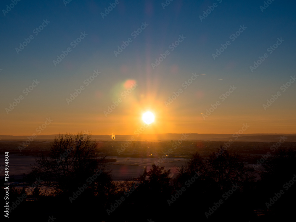 Sunset over the city of Olomouc, view from Svaty Kopecek (Holly Hill) in winter, Czech Republic.