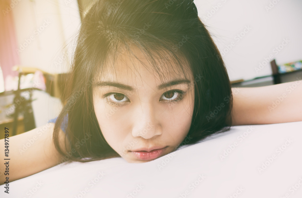 Cute sexy asian girl taking selfie on the bed Stock Photo | Adobe Stock
