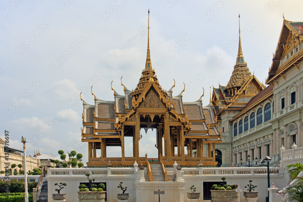 Fototapeta premium The Phra Thinang Aphorn Phimok Prasat - Royal Palace in Bangkok, Thailand. The pavilion is the epitome of Thai traditional architecture in proportion, style and detail. 