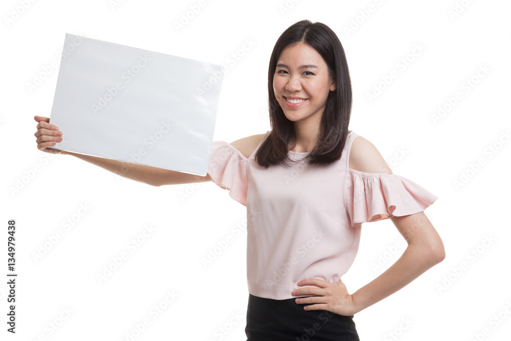 Young Asian business woman with white blank sign. Young Asian business woman with white blank sign.