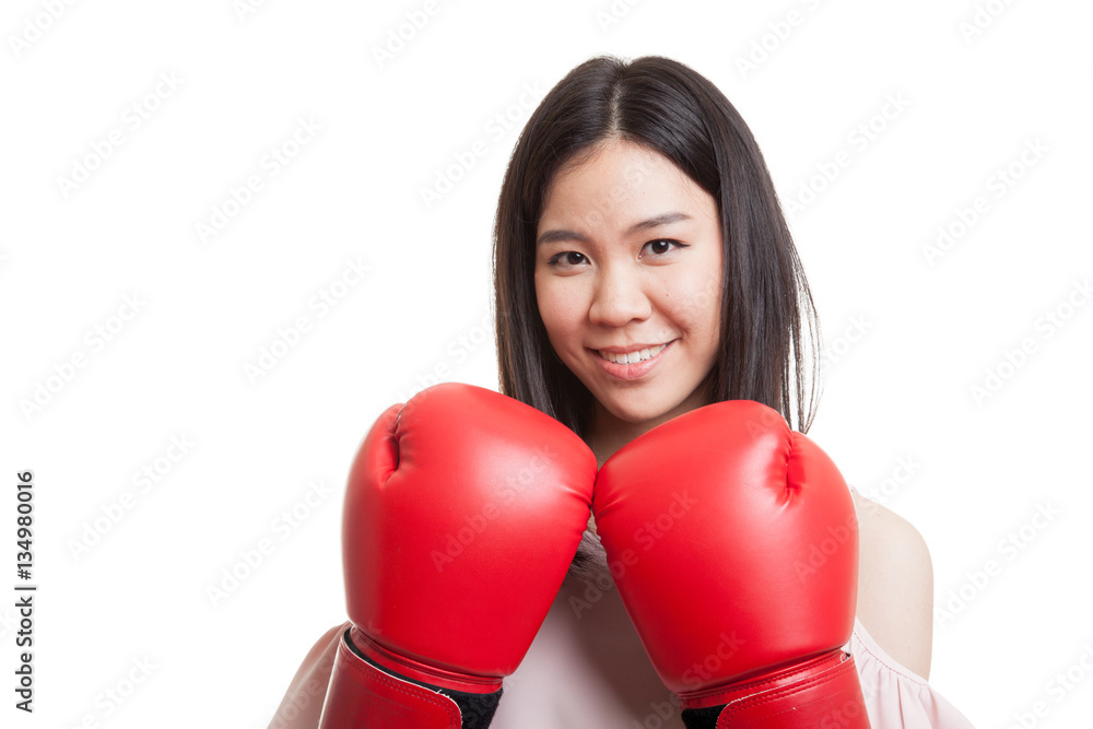 Young Asian business woman with red boxing gloves. Young Asian business woman with red boxing gloves.