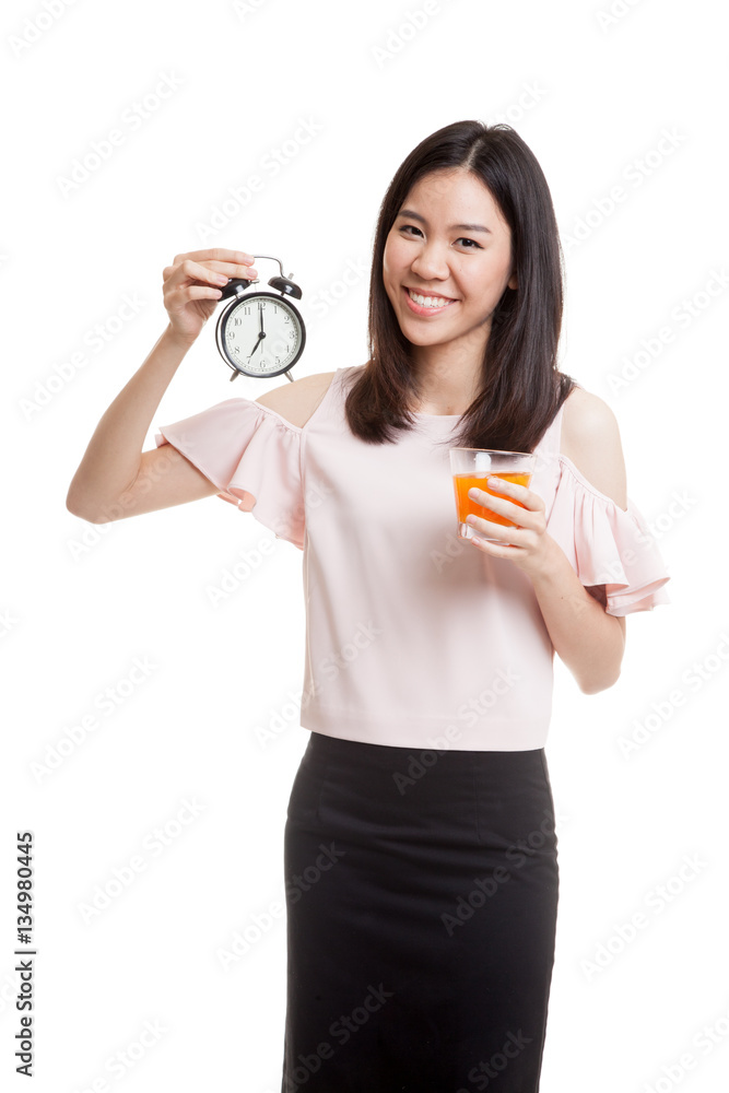 Asian woman with a clock drink orange juice. Asian woman with a clock drink orange juice.