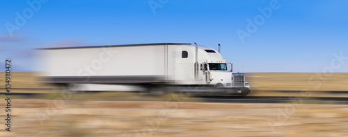 white truck on the move photo