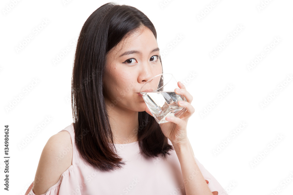 Young Asian woman with a glass of drinking water. Young Asian woman with a glass of drinking water.