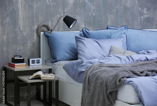 Bedroom interior with bed a...