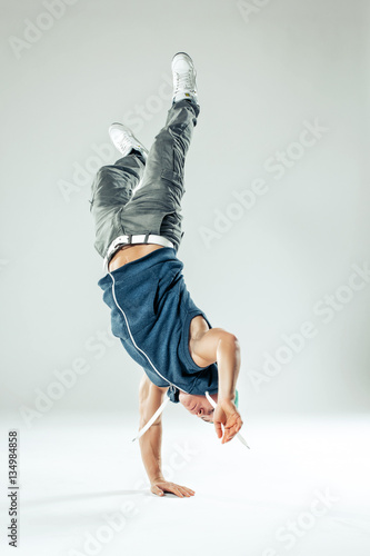 Man break dancer on white studio background