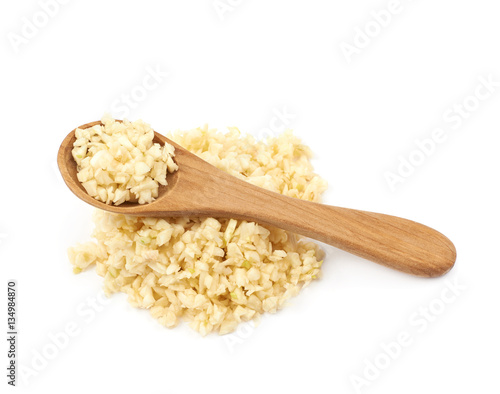 Pile of minced garlic isolated