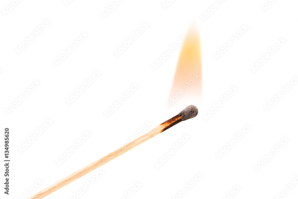 Burning safetymatch with red, orange, yellow fire. Isolated on white