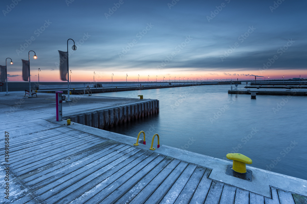 Cold winter morning, Pier in Sopot at sunrise time with amazing colorful sky. Poland.