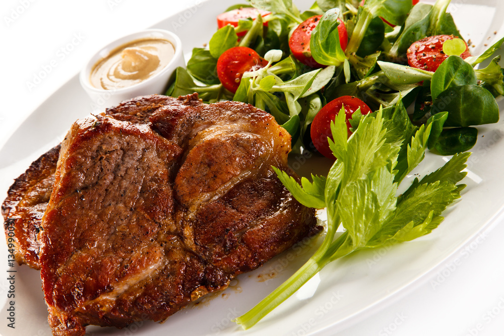 Grilled steaks and vegetables Grilled steaks and vegetables