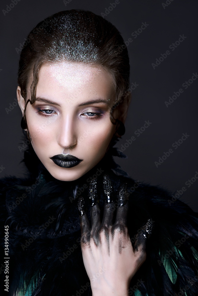 Black lips. Halloween Makeup. Luxury beautiful woman with dark lipstick and  black feather collar. Beauty stylish gothic girl Stock Photo | Adobe Stock