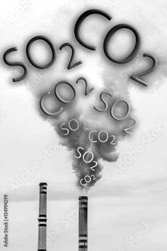 Smoke of chimneys writing CO2 and SO2 in the sky
