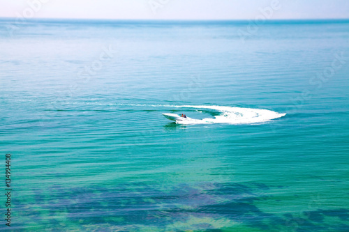 Motor boat on a blue sea © martinlisner