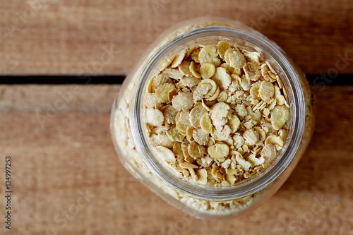 organic soy flakes in jar photo