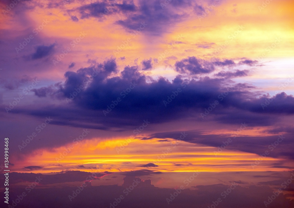 purple arch cloud in brilliant sunset sky