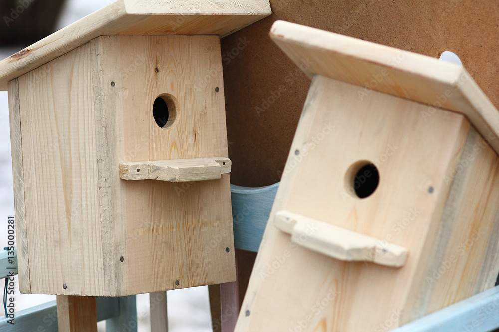 New houses for migratory birds. The birdhouses are manufactured and offered for sale. Selective focus