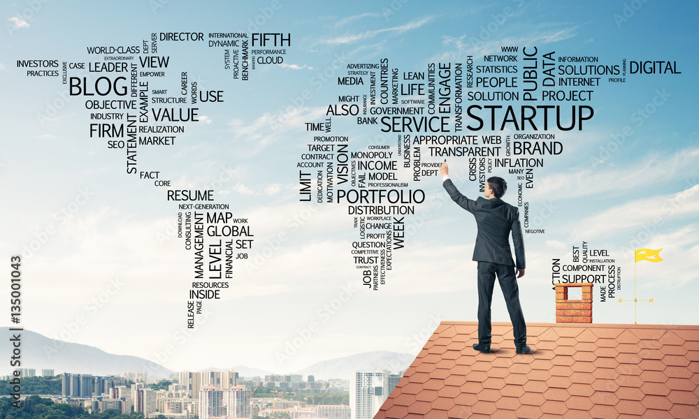 Businessman on brick roof draw world map as concept of globaliza Businessman on brick roof draw world map as concept of globaliza