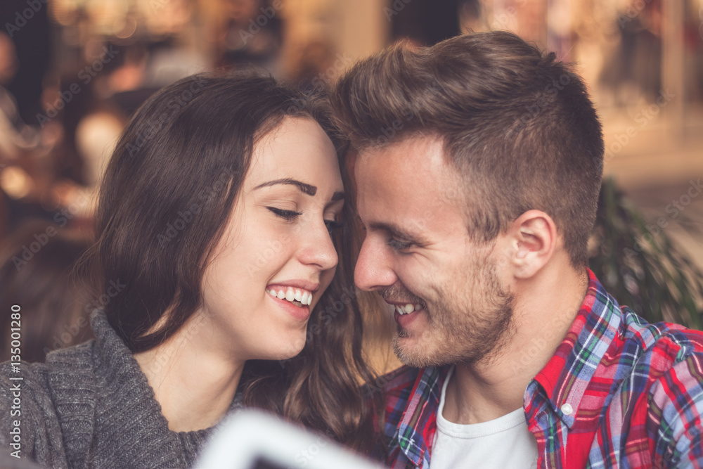 Young romantic couple in love taking selfie Young romantic couple in love taking selfie