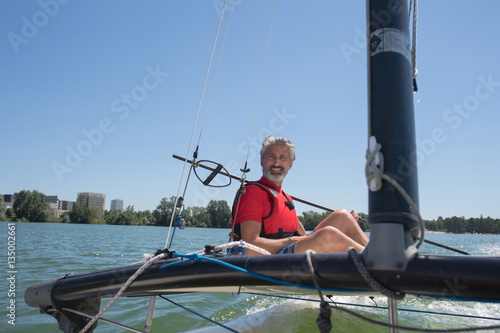enjoying extreme sailing with racing sailboat © auremar