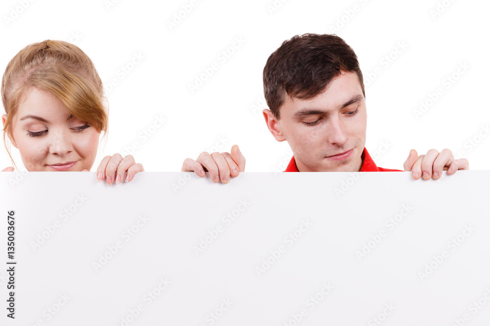 Couple with blank presentation board banner sign Couple with blank presentation board banner sign
