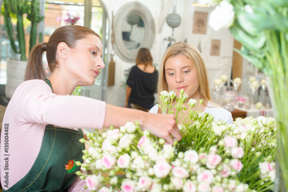 Florist with a customer Florist with a customer