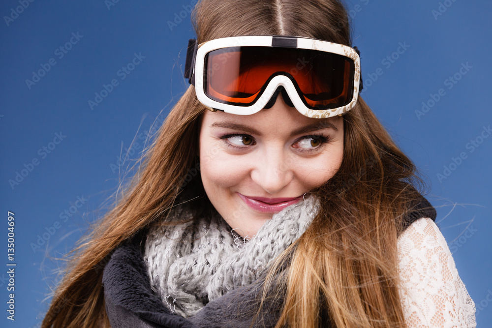 skier girl wearing warm clothes ski googles portrait. skier girl wearing warm clothes ski googles portrait.